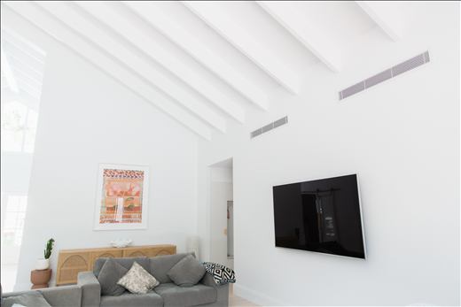 Ceiling grille installed flush in a home ceiling.